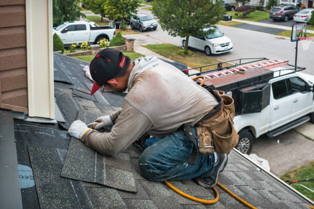 Professional Roofing technician working in Old Greenwich, CT